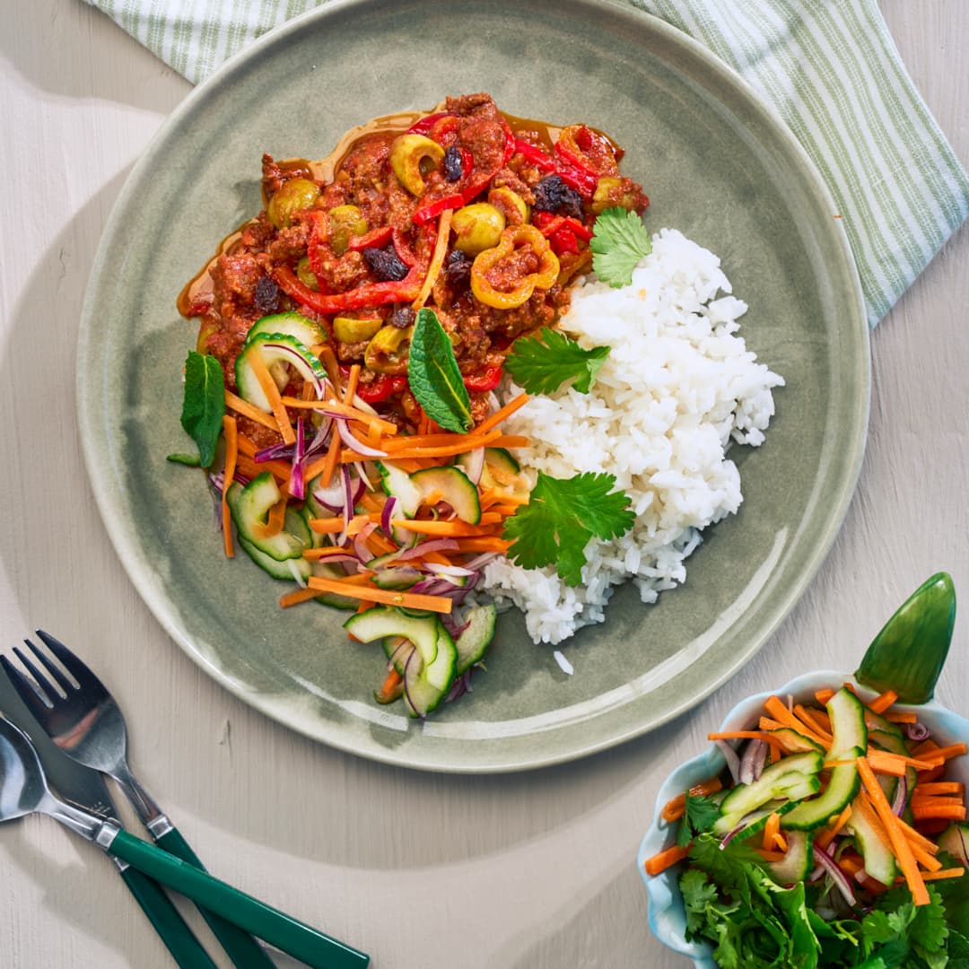 Picadillo med ris och limemarinerade grönsaker